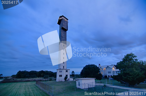 Image of Charleston lighthouse at night  located on Sullivan's Island in 