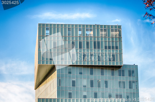 Image of modern office building architecture with blue sky