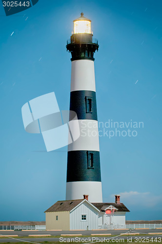 Image of Black and white striped lighthouse at Bodie Island on the outer 