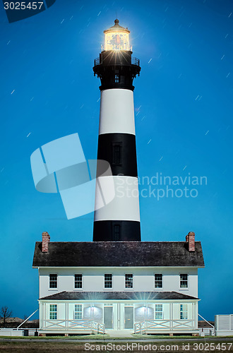 Image of Black and white striped lighthouse at Bodie Island on the outer 