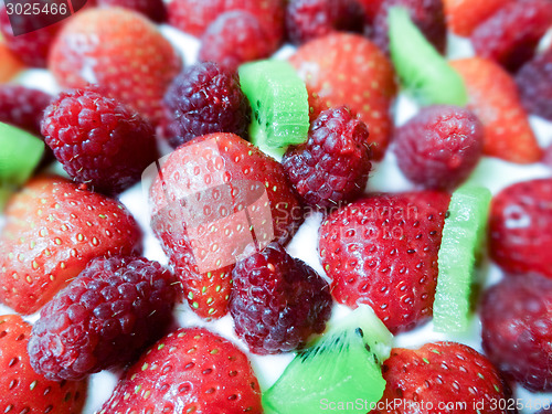 Image of Strawberry & kiwi birthday  cake with candles