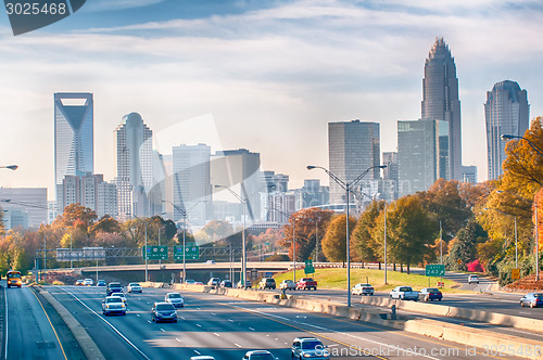 Image of charlotte north carolina skyline during autumn season at sunset