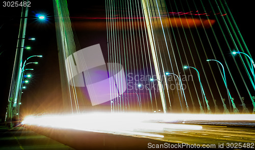 Image of Traffic on the bridge in the evening.