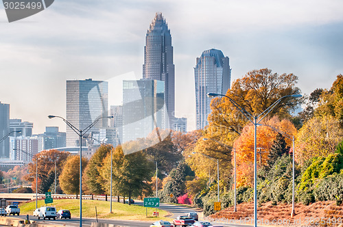 Image of charlotte north carolina skyline during autumn season at sunset