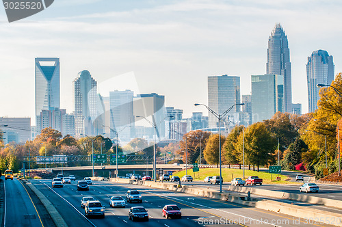 Image of charlotte north carolina skyline during autumn season at sunset