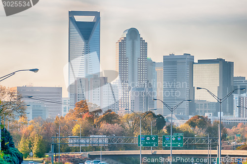 Image of charlotte north carolina skyline during autumn season at sunset