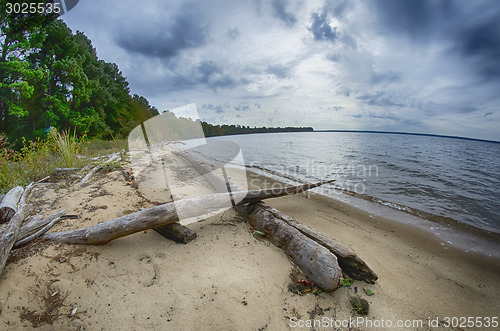 Image of cloudy skies over body of water