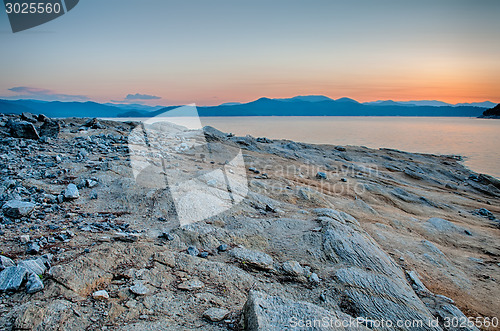 Image of Beautiful Mountain Lake Shoreline on a sunny Day