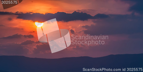 Image of nice sunset over mountains