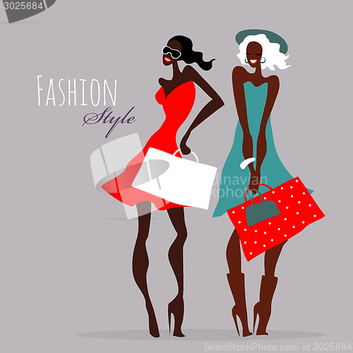 Image of Fashion girls. Women with shopping bags.