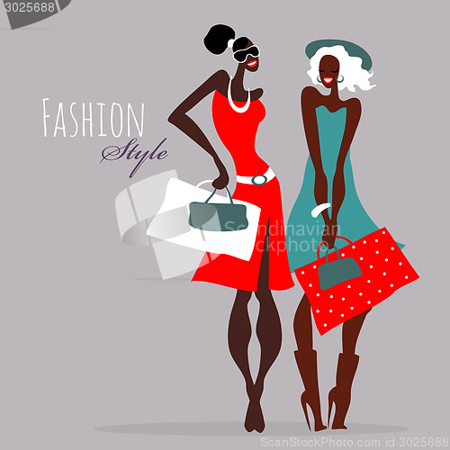 Image of Fashion girls. Women with shopping bags.