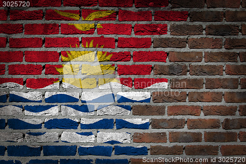 Image of Brick wall texture with flag