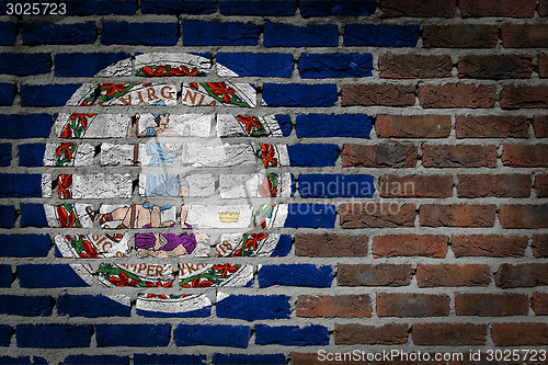 Image of Brick wall texture with flag