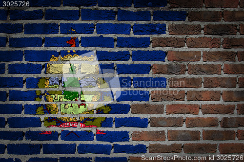 Image of Brick wall texture with flag