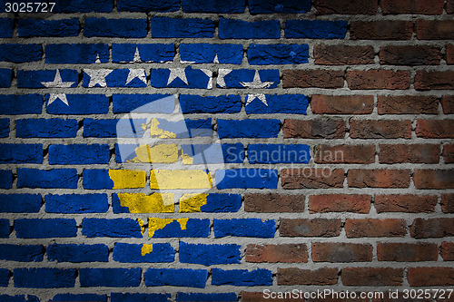 Image of Brick wall texture with flag