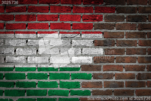 Image of Brick wall texture with flag