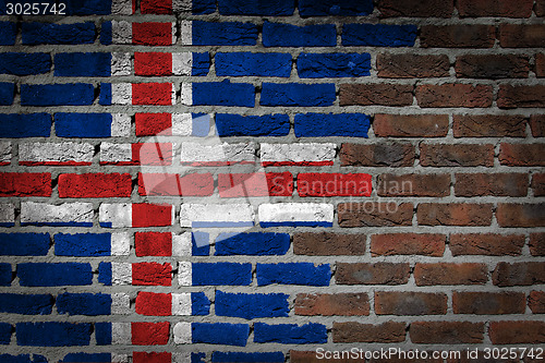 Image of Brick wall texture with flag