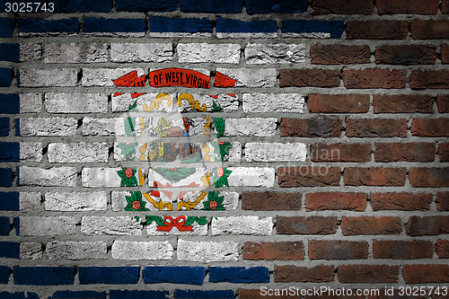 Image of Brick wall texture with flag