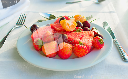 Image of Fruit dessert, diverse fruits and berries.