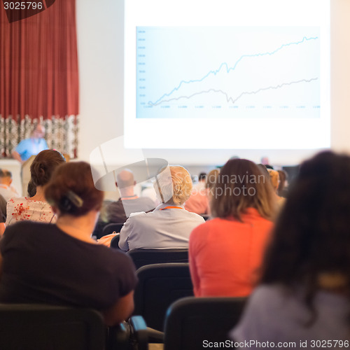 Image of Speaker at Business Conference and Presentation.