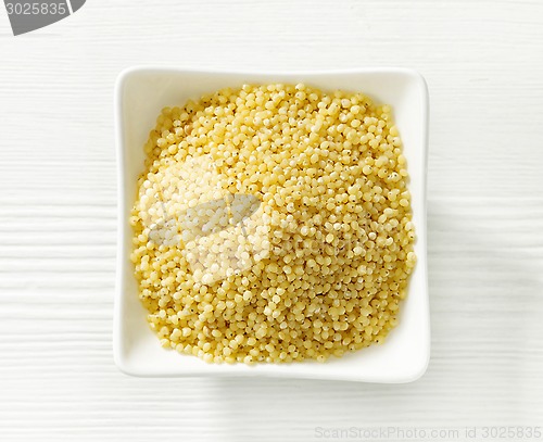 Image of bowl of millet grains