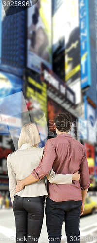 Image of Couple looking at billboards