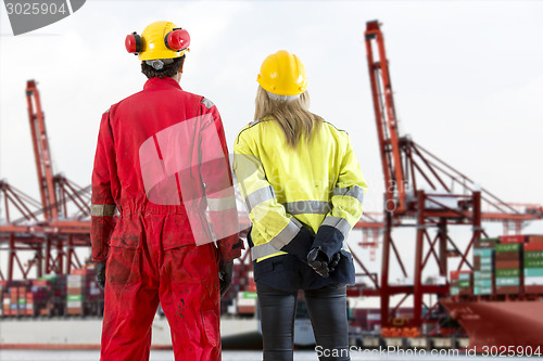 Image of Dockers looking at a container terminal