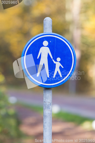 Image of Pedestrian with children on road sign