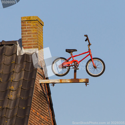 Image of Small rusty bicycle 