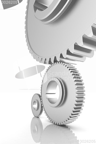 Image of White background consisting of bright gears and arrows.The conce