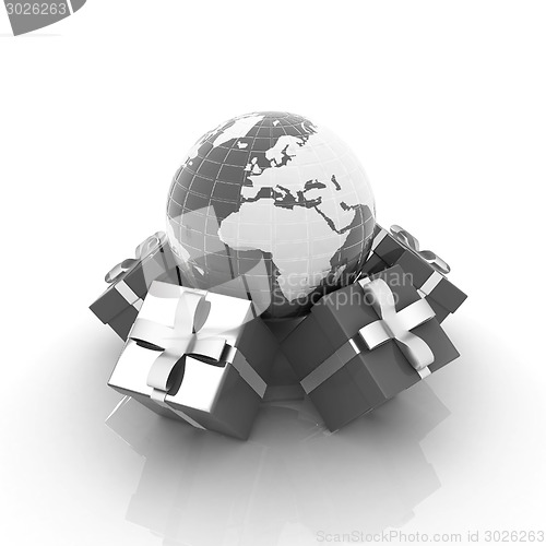 Image of Traditional Christmas gifts and earth. Global holiday concept 