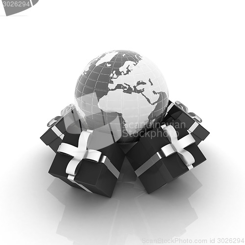 Image of Traditional Christmas gifts and earth. Global holiday concept 