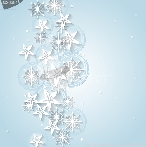 Image of Light blue Christmas background with winter flowers and snowflakes