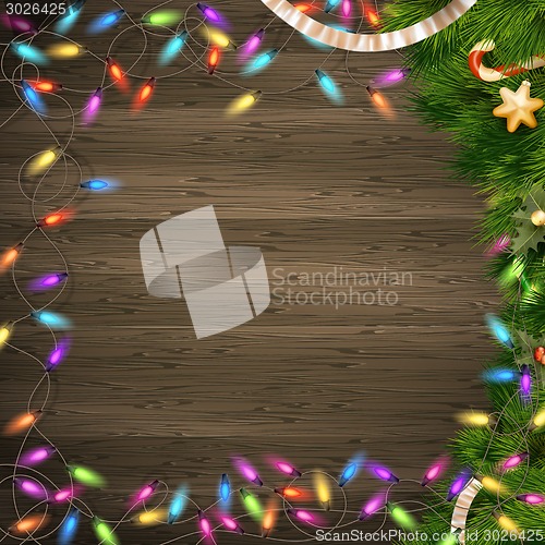 Image of Christmas tree branch with lights. EPS 10