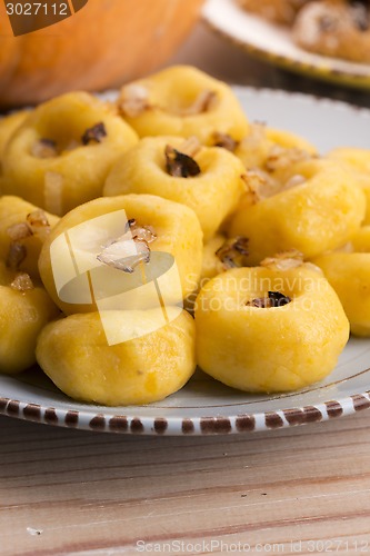 Image of Polish noodles ( kluski slaskie ) with potatoe and pumpkin