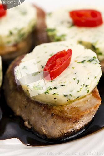 Image of steak with herbs butter