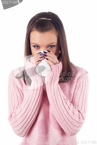 Image of Young attractive woman with cup