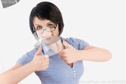 Image of Attractive woman with thumb up