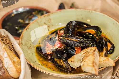 Image of Moules Marinieres - Mussels cooked with white wine sauce.