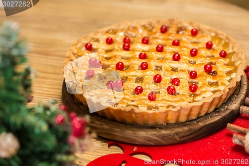 Image of Homemade christmas cake with wild berries.