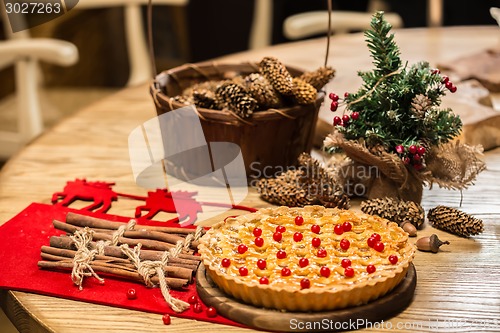 Image of Homemade christmas cake with wild berries.