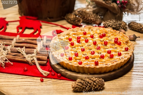 Image of Homemade christmas cake with wild berries.