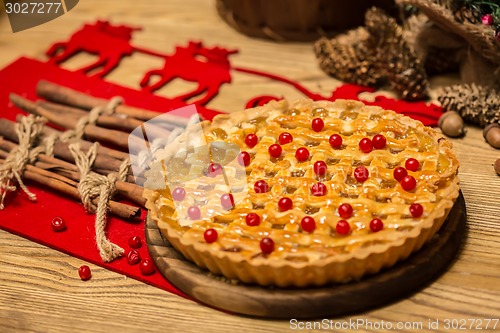 Image of Homemade christmas cake with wild berries.