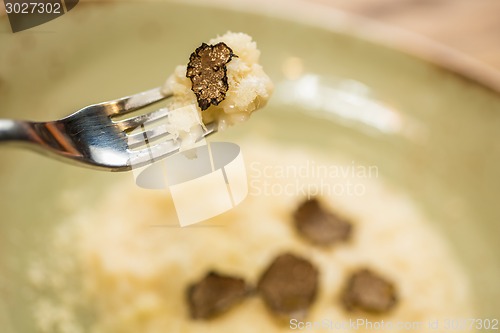 Image of Italian risotto with black truffle