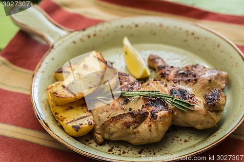 Image of Grilled Chicken Plate in a restaurant