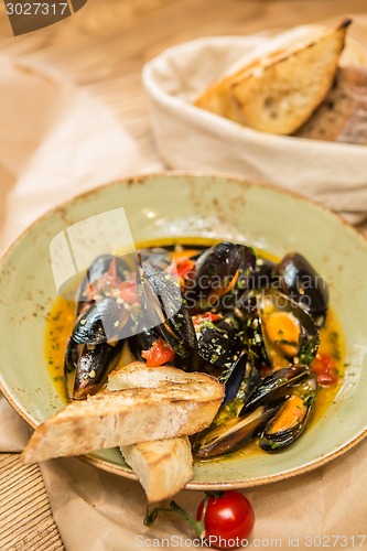 Image of Moules Marinieres - Mussels cooked with white wine sauce.