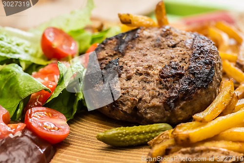 Image of still life with fast food hamburger menu