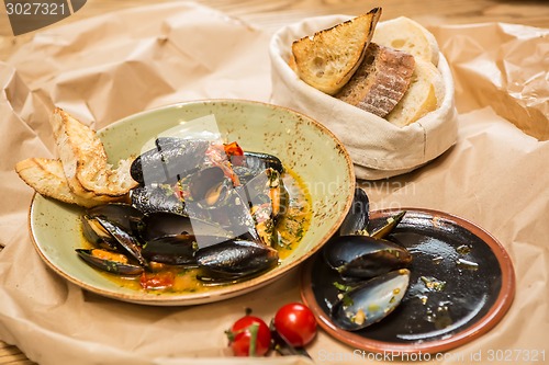 Image of Moules Marinieres - Mussels cooked with white wine sauce.