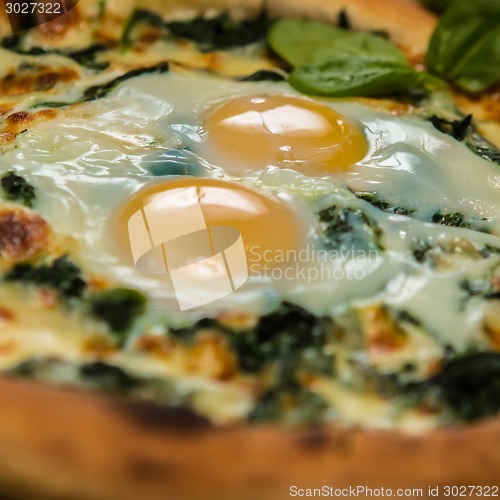 Image of Margarita pizza with arugula and egg