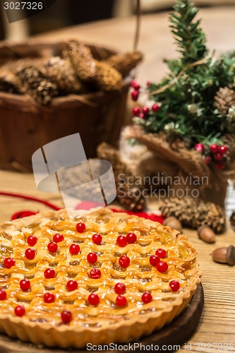 Image of Homemade christmas cake with wild berries.